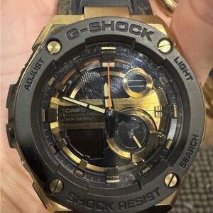 G-Shock Black and Gold Analog Watch(needs new battery)